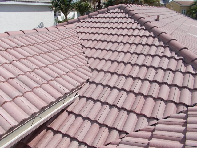 After photo of replaced roof tiles on multi-pitch roof