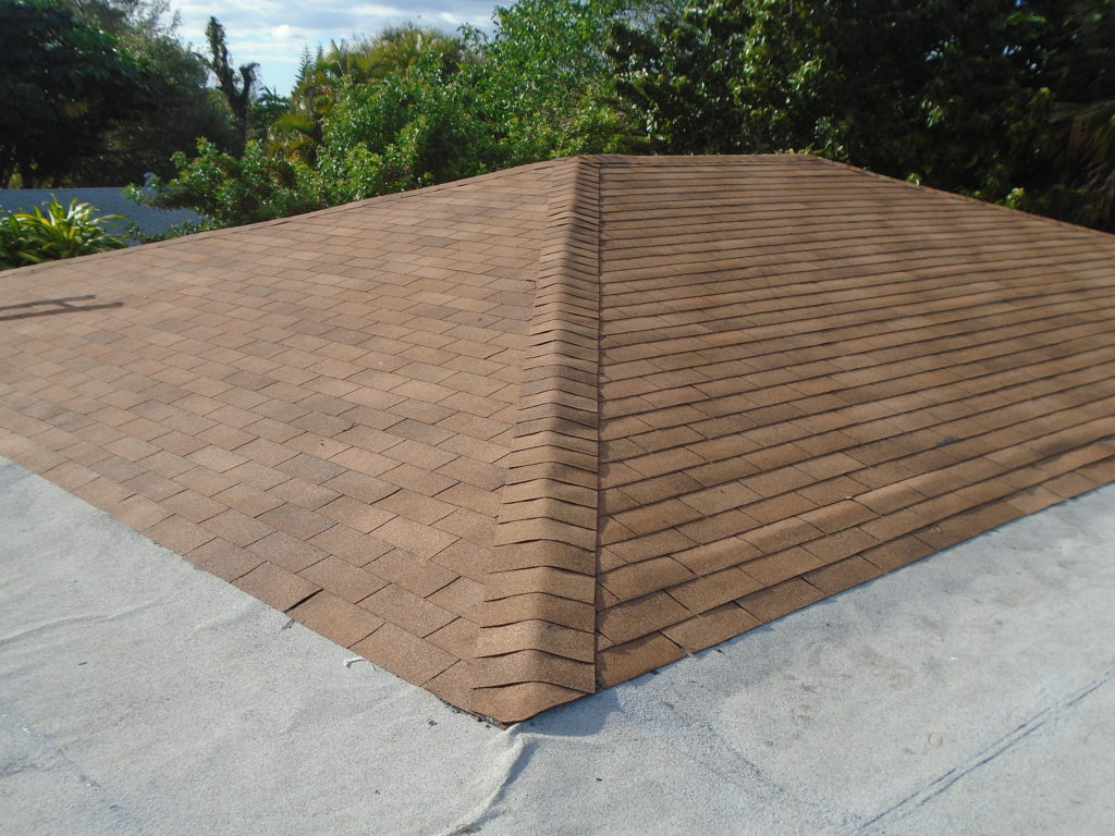 After photo of new shingle and flat roof
