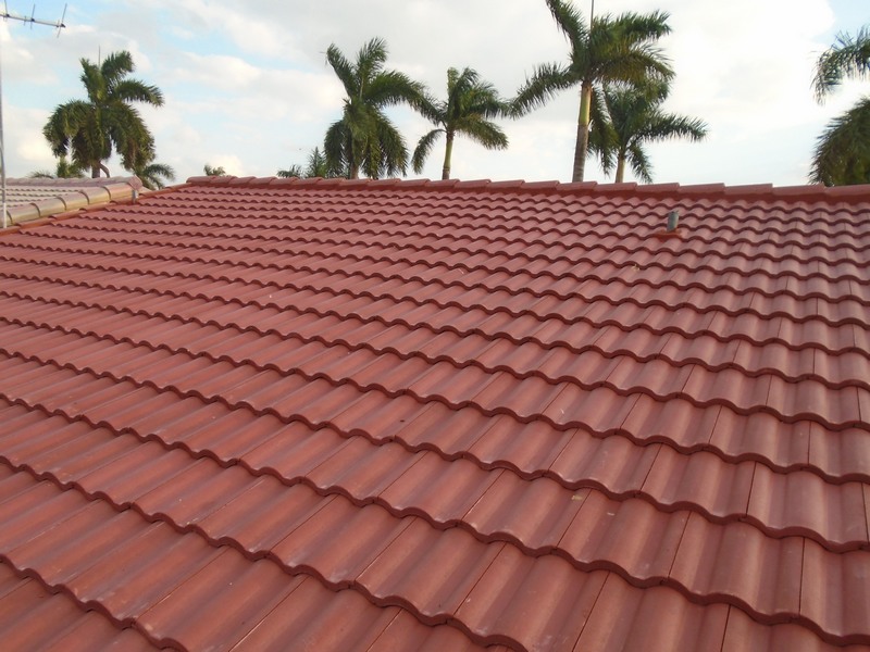 Close-up of Red double roll concrete roof tile installed in Hialeah