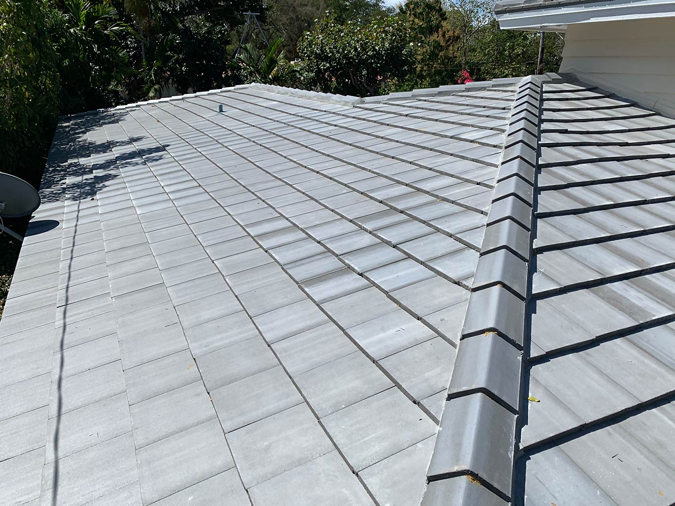 After photo of gray concrete roof tile installed in Coral Gables.