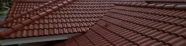 Side view of new double roll tile roof